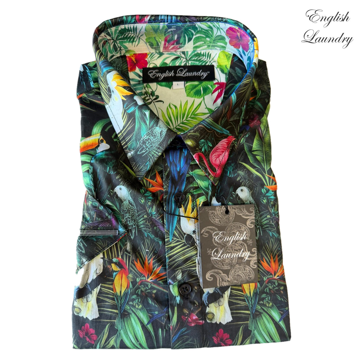 Folded English Laundry EL2732 shirt with tropical birds, green foliage and bright flowers on a dark background